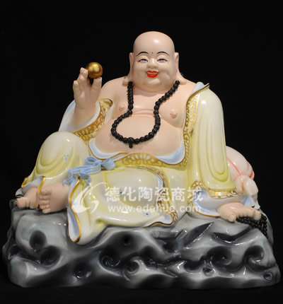 坐巖戲珠笑佛