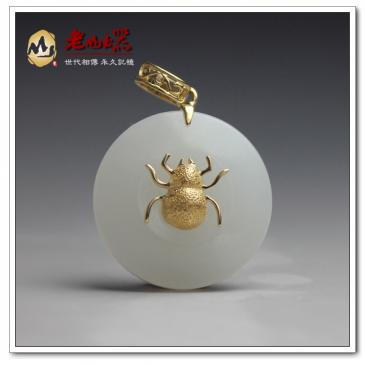 羊脂玉掛件金鑲玉圓滿